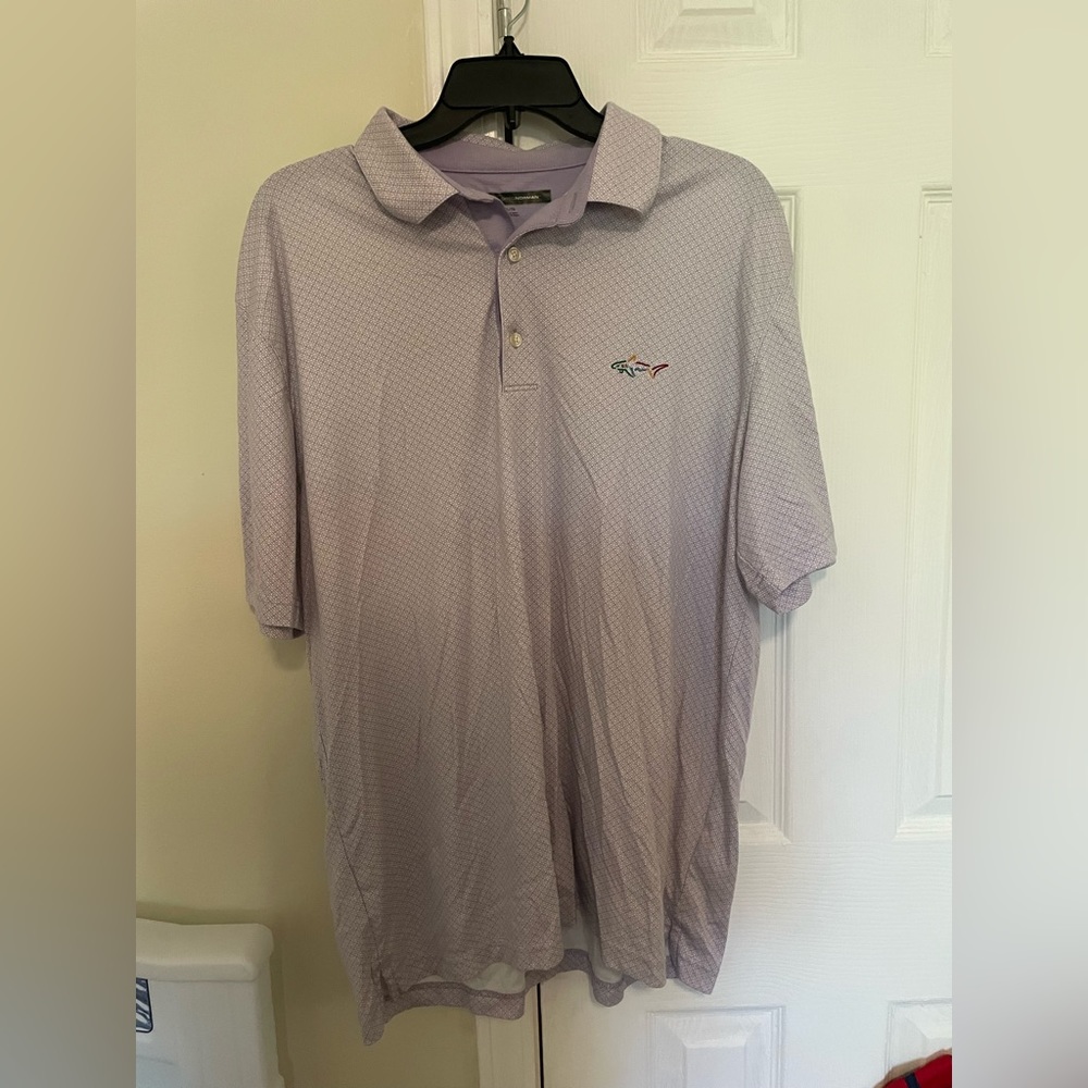 Purple Greg Norman polo. Only worn a few times. Great condition!
